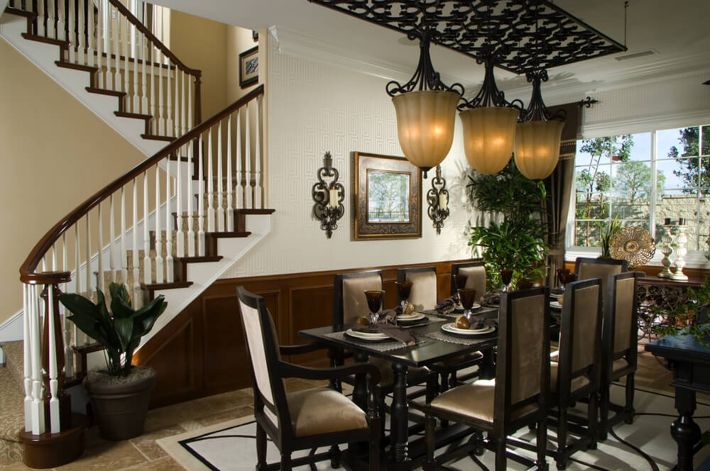 Dining room situated beside staircase with half-landing Dining room situated beside staircase with half-landing