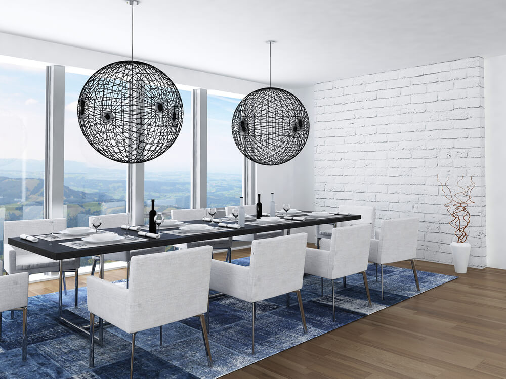 Apartment dining room with spectacular views through the floor-to-ceiling windows Apartment dining room with spectacular views through the floor-to-ceiling windows