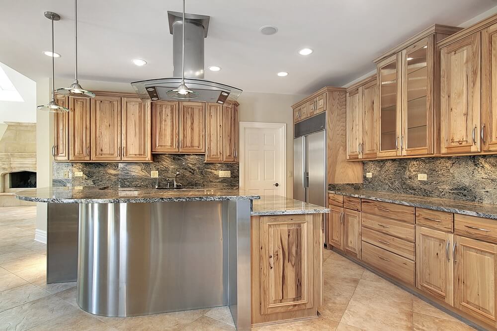 Here we have a an example of the high contrast between reflective metal surfaces and natural looking wood tones. Here we have a an example of the high contrast between reflective metal surfaces and natural looking wood tones.