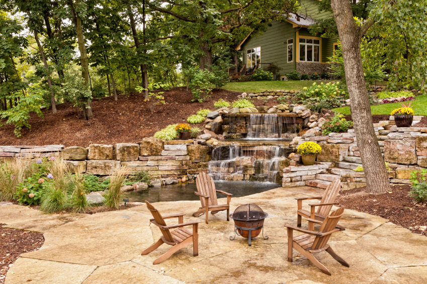 building a backyard waterfall with flagstone