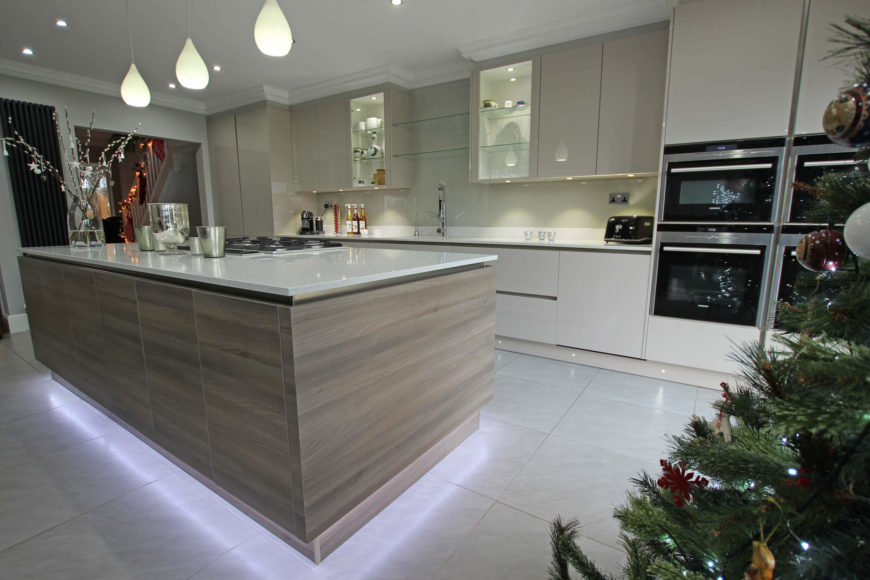 The cooktop adds an element of utility to this large island, as does built-