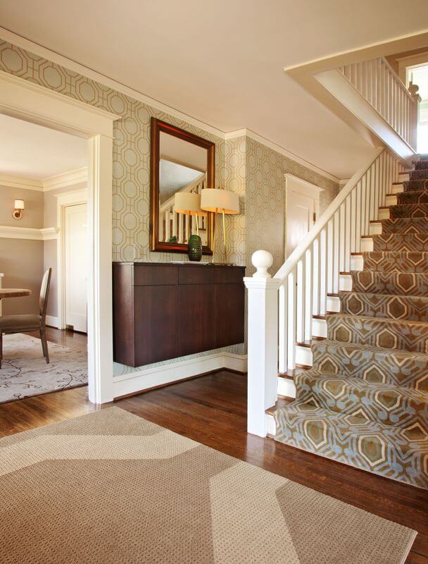 Entry Color Wood Tones Geometric patterns dominate this space, bringing both interest and color. Varying wood tones complement