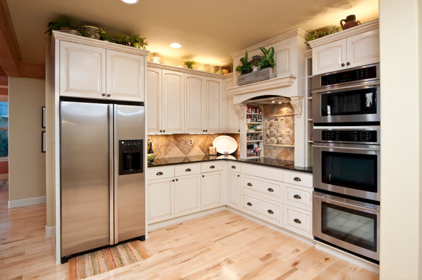 Recessed lighting helps to create a great ambient glow around the room and ensure that every space is well lit. Can lights are a common form of recessed lighting, as seen here.