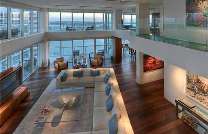this above view from the second floor shows the massive sectional sofa and glass topped - Hardwood Floors Living Room this above view from the second floor shows the massive sectional sofa and glass topped - Hardwood Floors Living Room