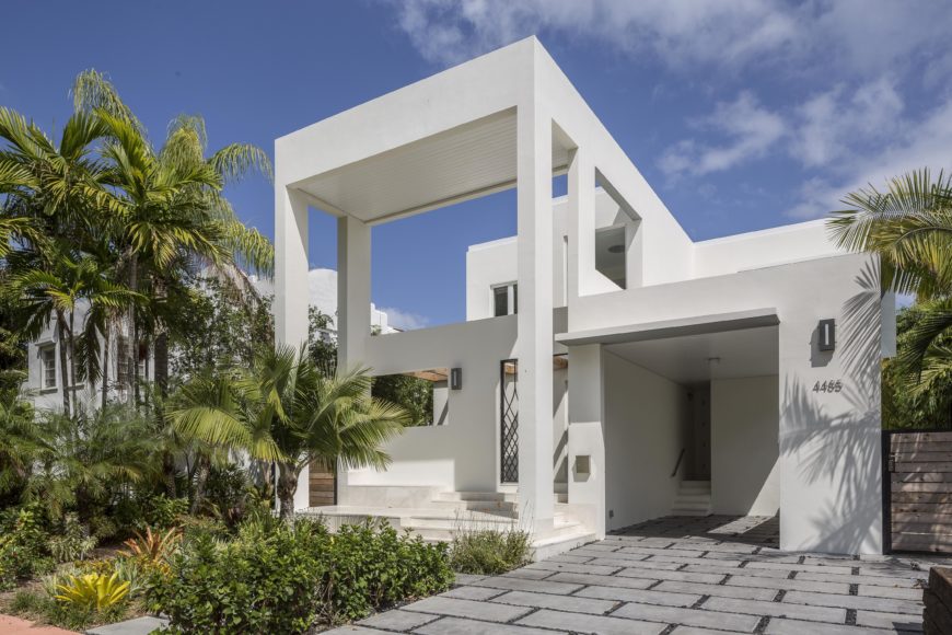 Front entryway prominently discloses its multi-layered approach, with soaring roof extension over outer wall, concealing actual front door deep in the structure. Front entryway prominently discloses its multi-layered approach, with soaring roof extension over outer wall, concealing actual front door deep in the structure.