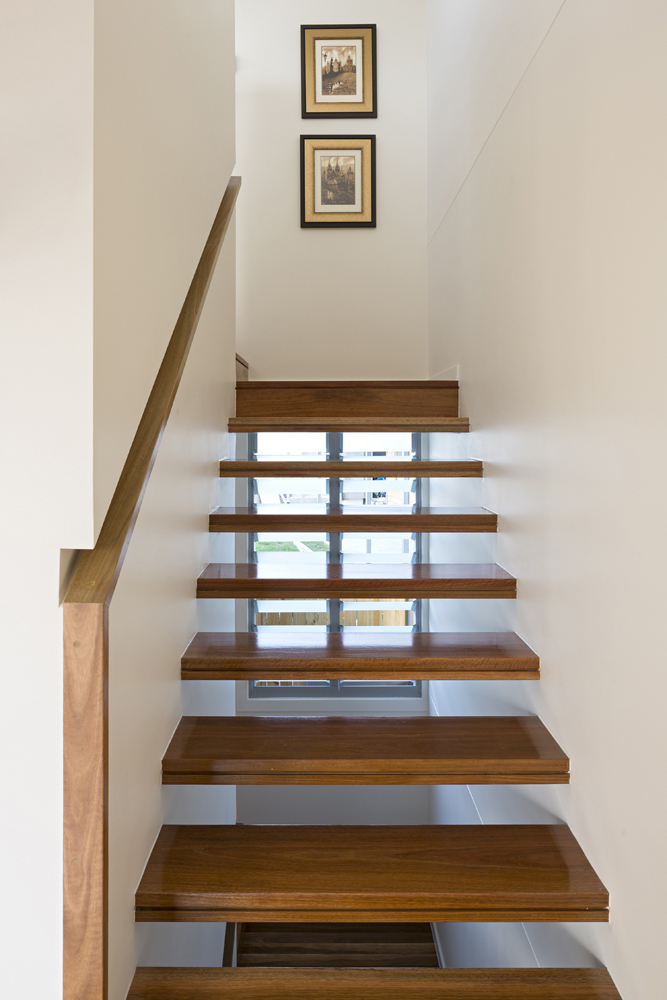 Stairway features natural wood floating steps, for light and visuals straight through. Stairway features natural wood floating steps, for light and visuals straight through.