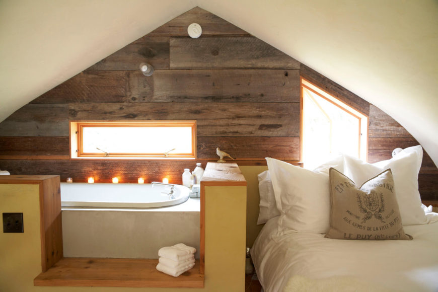 The apartment's bedroom is combined with the bathroom, separated by a small enclosure. The apartment's bedroom follows the same design themes as the rest of the home's bedrooms. The apartment's bedroom is combined with the bathroom, separated by a small enclosure. The apartment's bedroom follows the same design themes as the rest of the home's bedrooms.