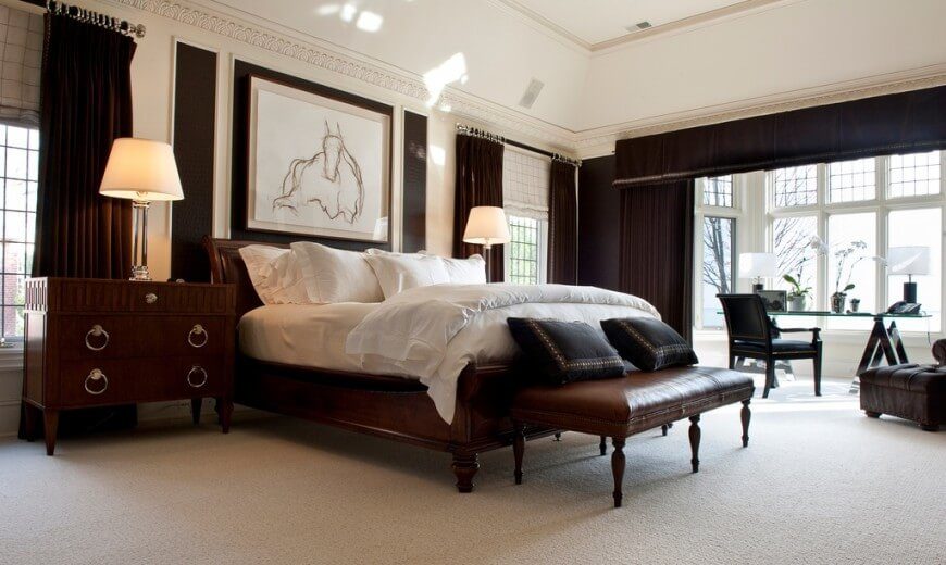 casual bedroom with dark furniture and cream fabrics