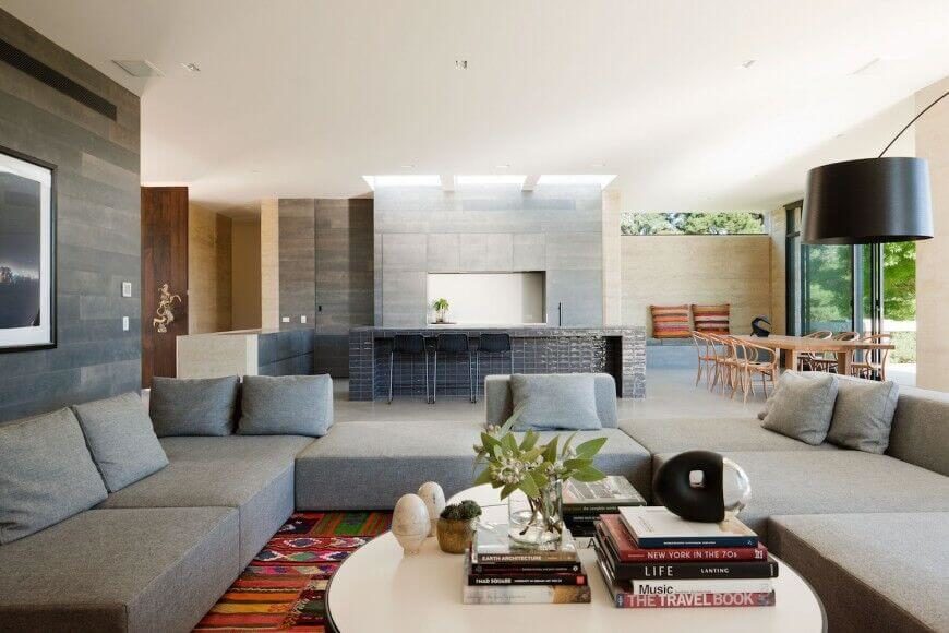 the smooth lines and textures of this contemporary open concept home are subtle decoration that