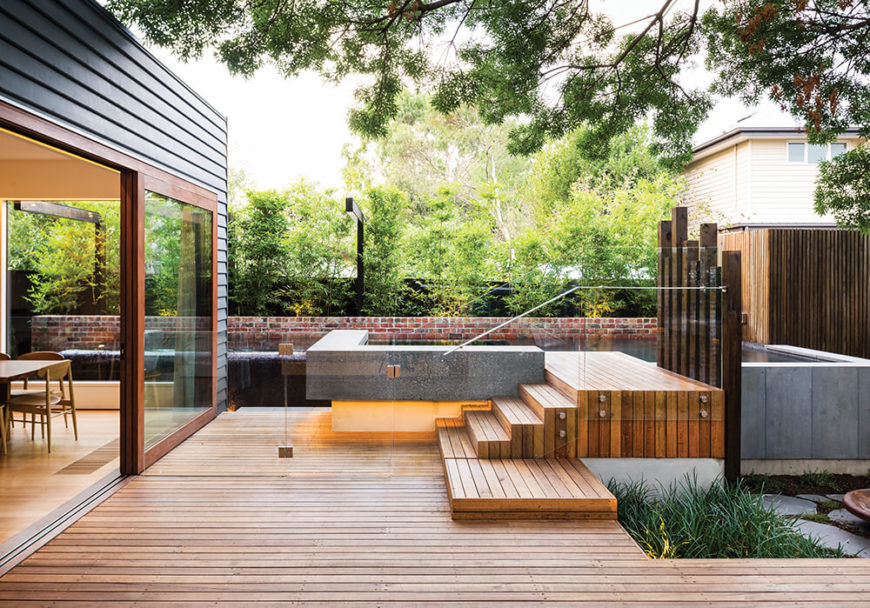 At the center of the timber deck, we see the complex interplay of forms and materials. The glass balustrade wrapping the pool area makes for unobstructed views across the landscape. At the center of the timber deck, we see the complex interplay of forms and materials. The glass balustrade wrapping the pool area makes for unobstructed views across the landscape.