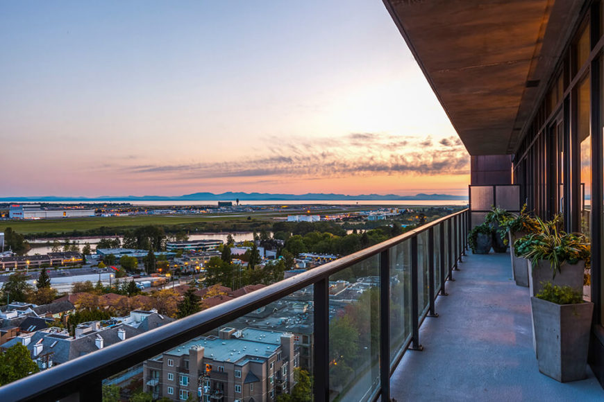 A broad balcony runs the length of the apartment, wrapped in slim metal railings and a glass balustrade for the ultimate panoramas. The balcony has enough room for several large container gardens with space to spare for relaxing with a view. A broad balcony runs the length of the apartment, wrapped in slim metal railings and a glass balustrade for the ultimate panoramas. The balcony has enough room for several large container gardens with space to spare for relaxing with a view.