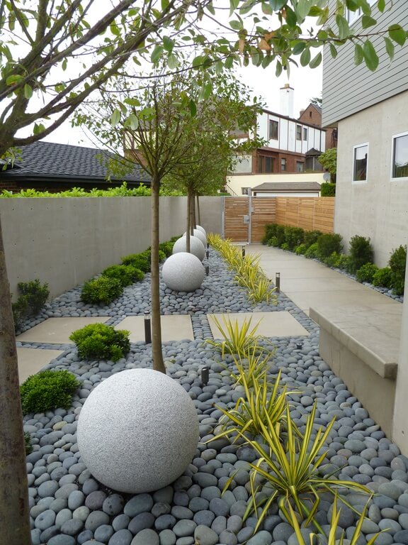 Bamboo fencing isn't just for Zen gardens. This home has a combination of minimalist concrete fencing with bamboo slat fencing on one side. In a minimalist or industrial modern home, bamboo can add a much needed natural contrast. Bamboo fencing isn't just for Zen gardens. This home has a combination of minimalist concrete fencing with bamboo slat fencing on one side. In a minimalist or industrial modern home, bamboo can add a much needed natural contrast.