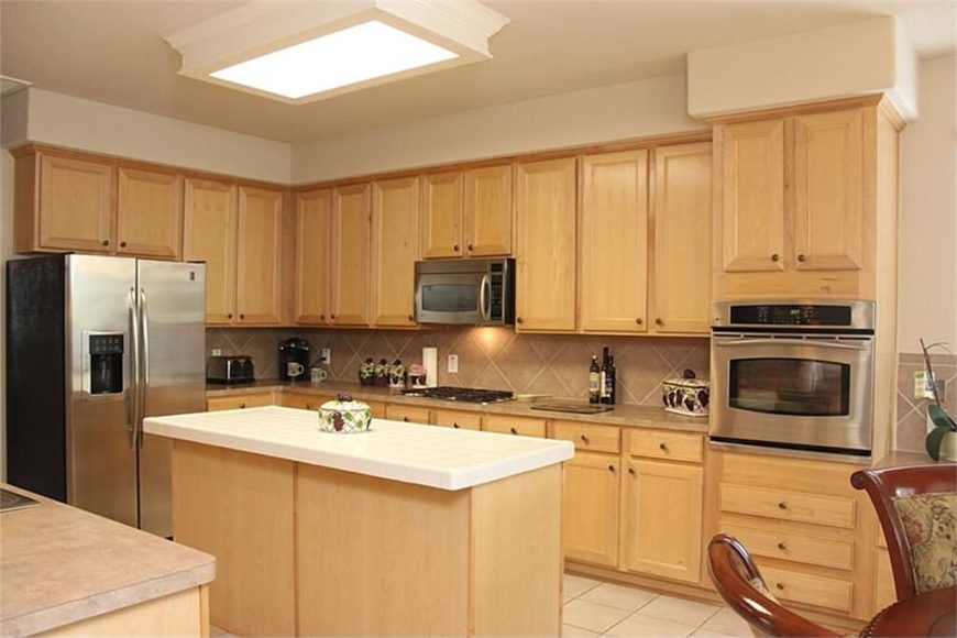 Here's the kitchen before the renovation. It's a perfectly nice space, but nothing special. The cabinetry in particular is pretty neutral and unmemorable. The renovation completely changed this room. Here's the kitchen before the renovation. It's a perfectly nice space, but nothing special. The cabinetry in particular is pretty neutral and unmemorable. The renovation completely changed this room.