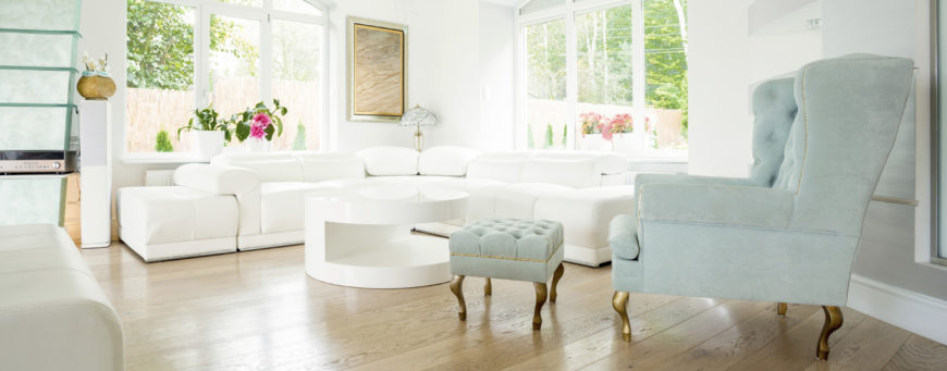 this blue accent chair is accompanied by a small matching ottoman both are elegant - Living Rooms With Ottomans this blue accent chair is accompanied by a small matching ottoman both are elegant - Living Rooms With Ottomans