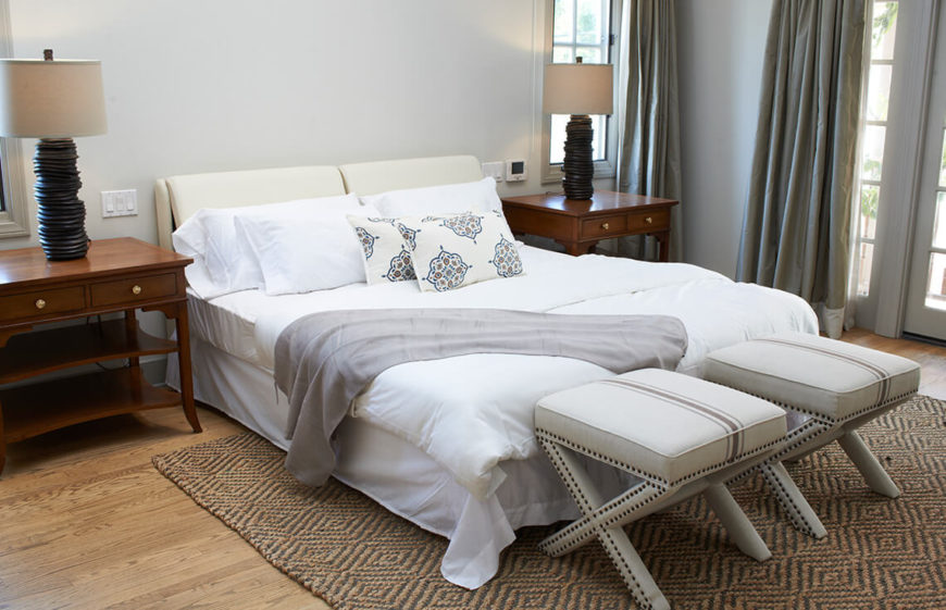 Again, we see benches and patterns used to draw the eye to the bed as a focal point. Decorative lamps add an interesting element. Again, we see benches and patterns used to draw the eye to the bed as a focal point. Decorative lamps add an interesting element.