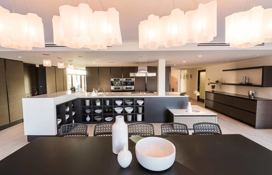 Here is another angle on this simple and modern kitchen design. Here we can see all of the counter surfaces in the kitchen, and how they are decorated. There is no overbearing clutter and appliances. There are only tasteful, small groups of items that liven up the space. Including a flower to bring some interesting depth to the space.Another angle on this simple and modern kitchen design. Here we can see all of the counter surfaces in the kitchen, and how they are decorated. There is no overbearing clutter and appliances. There are only tasteful, small groups of items that liven up the space. Including a flower to bring a bring some interesting depth to the space. Here is another angle on this simple and modern kitchen design. Here we can see all of the counter surfaces in the kitchen, and how they are decorated. There is no overbearing clutter and appliances. There are only tasteful, small groups of items that liven up the space. Including a flower to bring some interesting depth to the space.