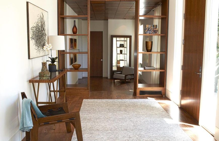 This brightly lit foyer shows a very open and welcoming entrance. The flow in this foyer invites people coming through to enter into the rest of the house. This room sets the tone for the visit as a bright and warm experience. This brightly lit foyer shows a very open and welcoming entrance. The flow in this foyer invites people coming through to enter into the rest of the house. This room sets the tone for the visit as a bright and warm experience.
