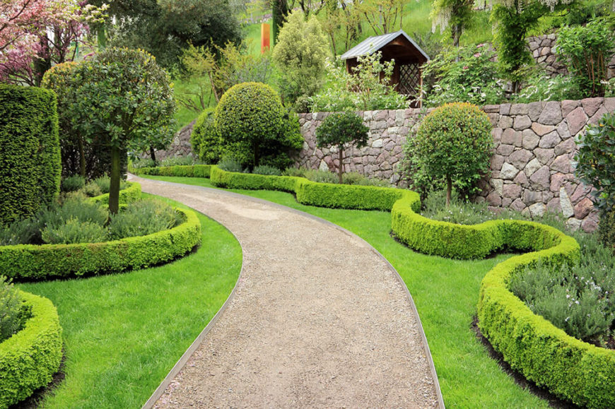 Hedges and trees pair perfectly to make a garden design. They can both be shaped and made to fit your design. This large garden of trees and shrubs makes a wonderful design to look at while you travel this path. Hedges and trees pair perfectly to make a garden design. They can both be shaped and made to fit your design. This large garden of trees and shrubs makes a wonderful design to look at while you travel this path.