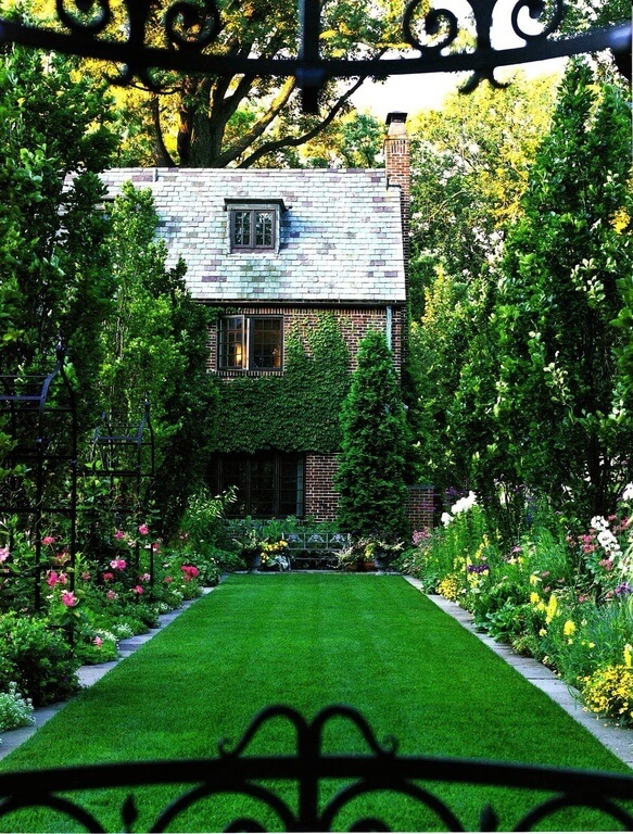 One use for a large garden is to outline a lawn. Here we see a well manicured lawn area outlined by an amazing and lush, large garden. The garden works to build the boundaries of the lawn. One use for a large garden is to outline a lawn. Here we see a well manicured lawn area outlined by an amazing and lush, large garden. The garden works to build the boundaries of the lawn.