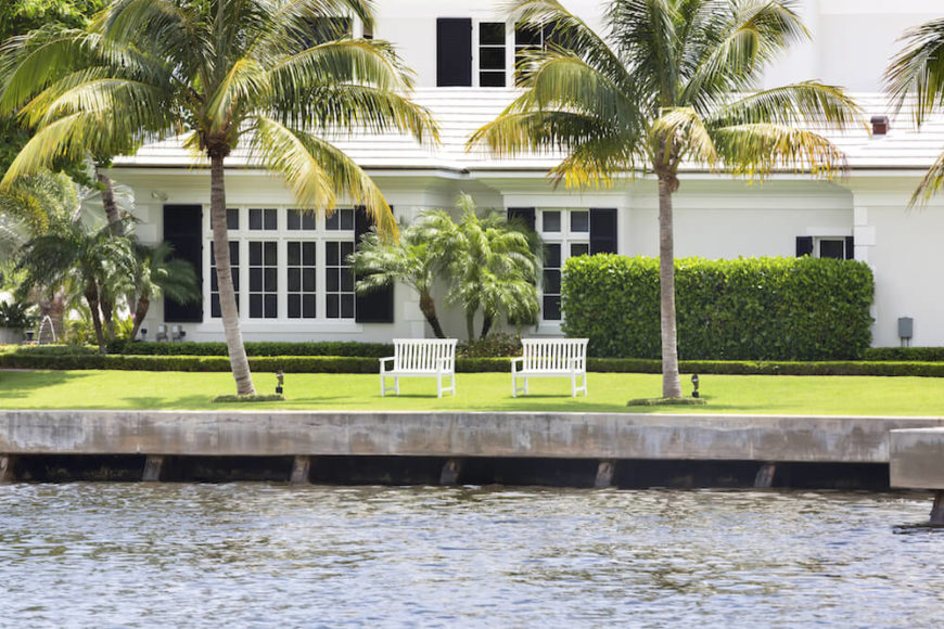 These palms stand on either side of a pair of matching benches on the waterfront. This is the perfect tropical style for sitting back, relaxing, and looking out over the water.
These palms stand on either side of a pair of matching benches on the waterfront. This is the perfect tropical style for sitting back, relaxing, and looking out over the water.