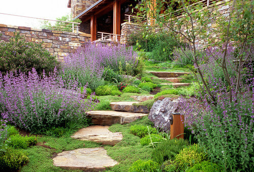 If your stone steps are made from large slabs it is easy to segway your steps into a stone walkway. This is a great way to tie your steps into your landscape. If your stone steps are made from large slabs it is easy to segway your steps into a stone walkway. This is a great way to tie your steps into your landscape.